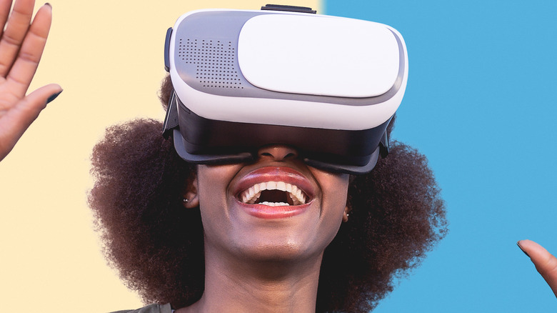 Young woman wearing VR headset