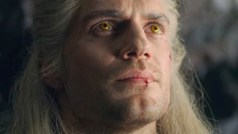 Geralt orange eyes looking up