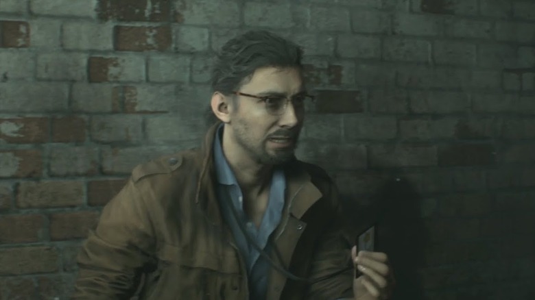 Ben Bertolucci holding his badge