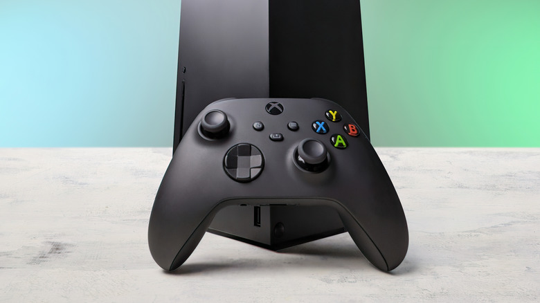 Xbox series X|S controller in front of console