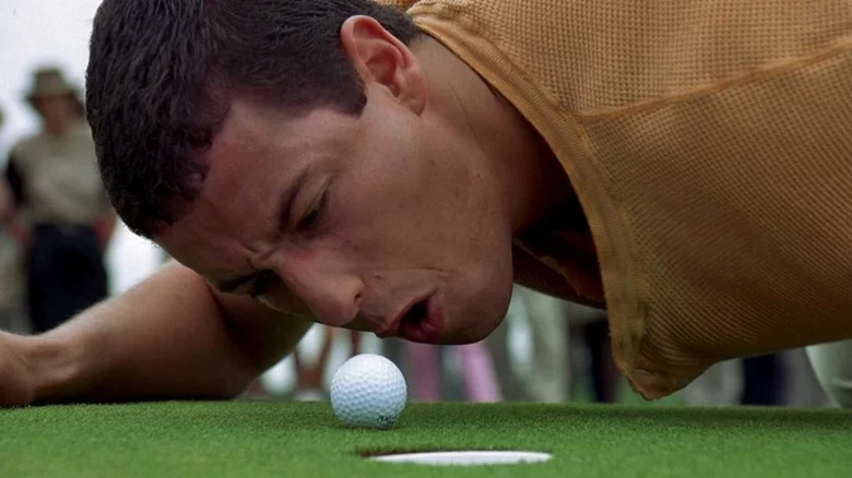 Happy yells at golf ball