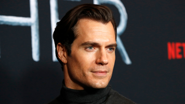 Henry Cavill smiling and looking sharp