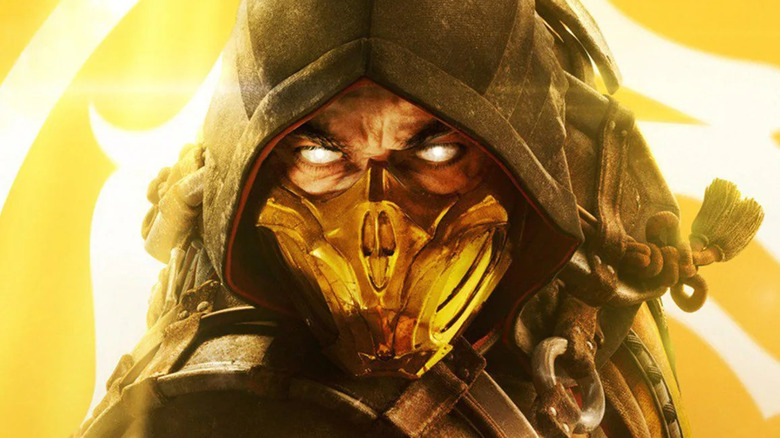 Scorpion poses with his kunai just out of frame on the cover art for Mortal Kombat 11