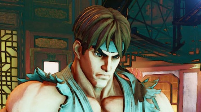 Ryu kneeling and scowling