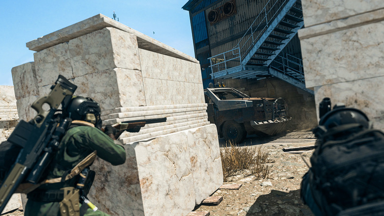 Warzone 2.0 characters shooting behind cover