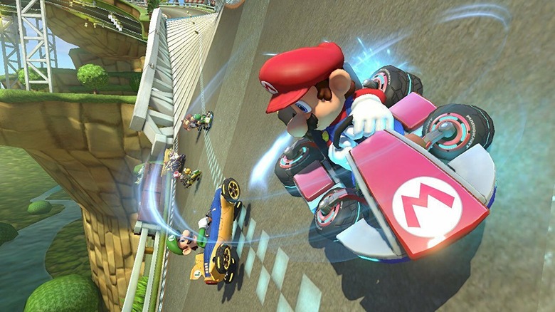 Racers sliding along with antigravity in "Mario Kart 8"