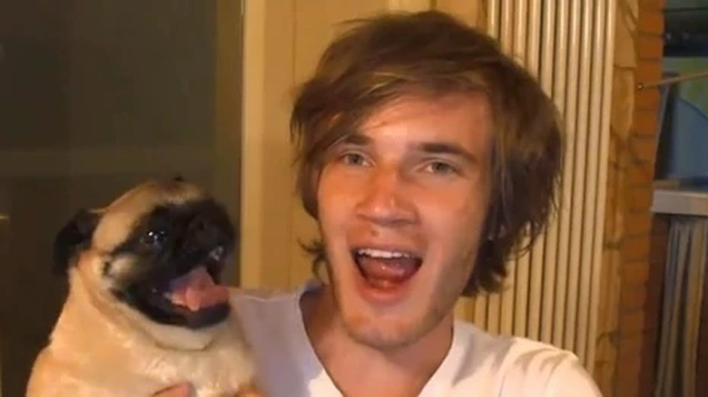 Pewds holds Maya