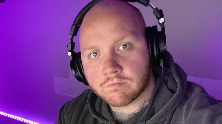 Tim looks at the camera