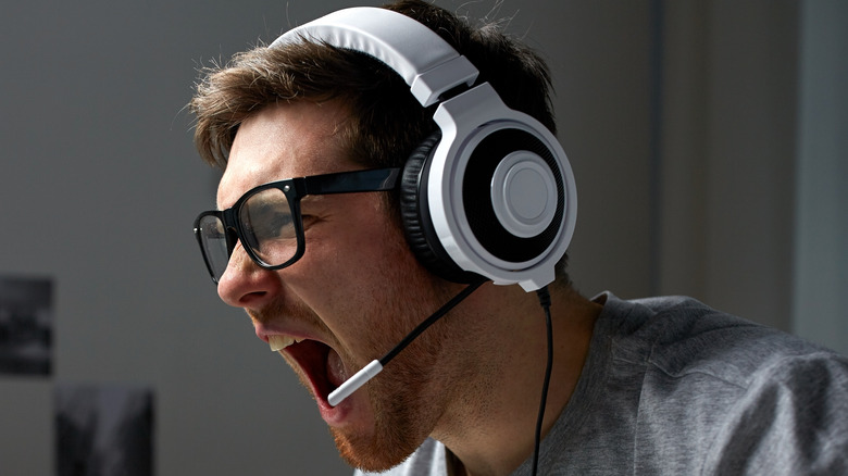 gamer with headset yells