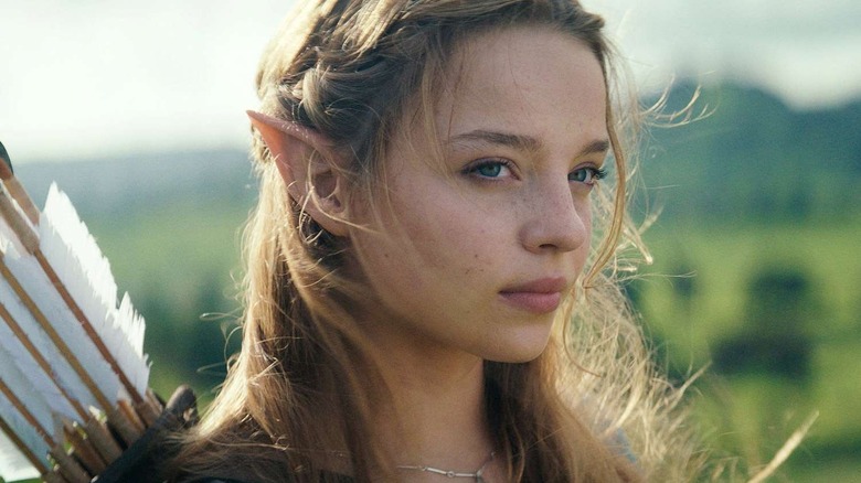 Princess Zelda stands with a quiver of arrows on her back in The Legend of Zelda