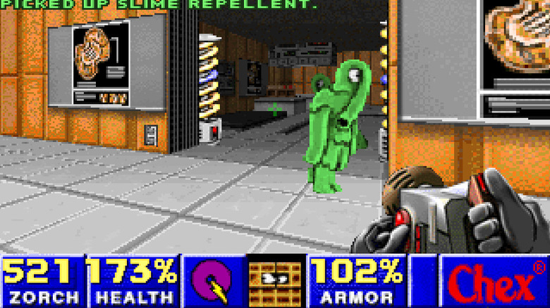 The player character aims a weapon at a walking green slime monster in Chex Quest