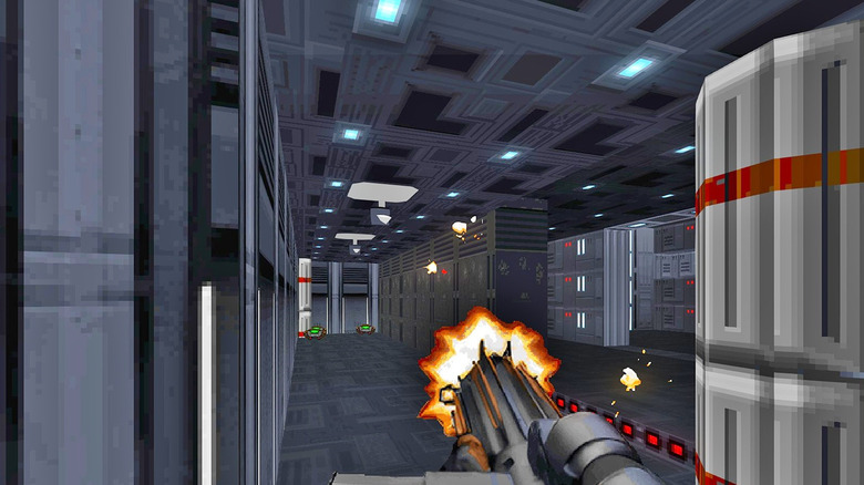 Kyle Katarn fires his blaster down a hallway in Star Wars: Dark Forces