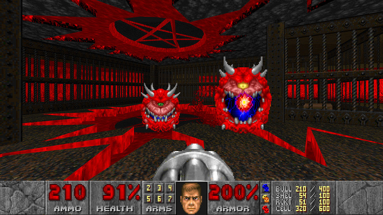 Two Cacodemons attack the player in fiery cavern in Doom (1993)