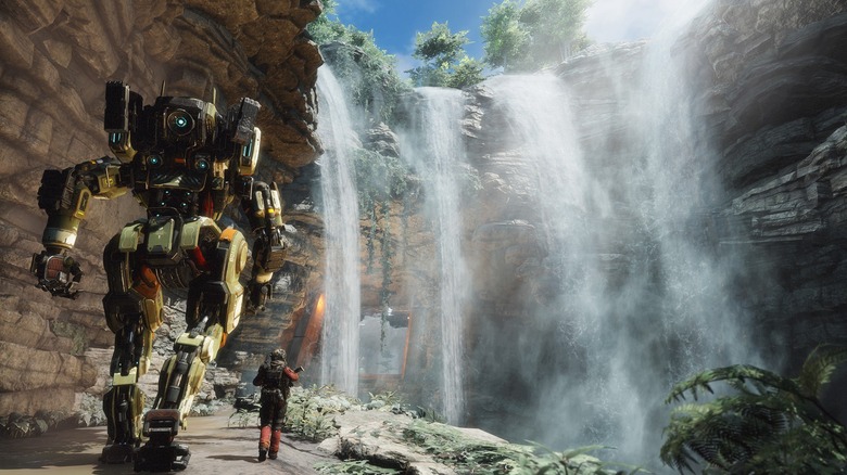 A titan and human walking by a waterfall in "Titanfall 2" (2016)