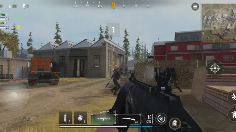 A player approaches two soldiers with an assault rifle in Call of Duty: Warzone Mobile