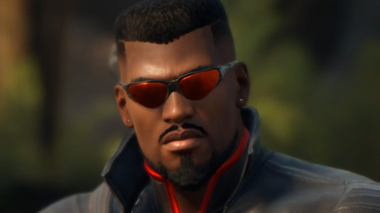 Blade in sunglasses with arms crossed
