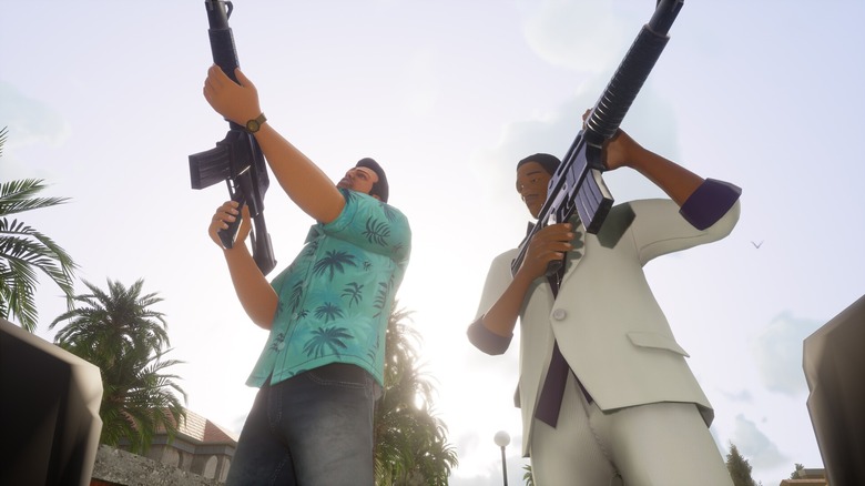 Lance and Tommy holding guns