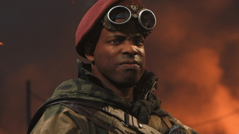 Arthur Kingsley holding a gun before battle