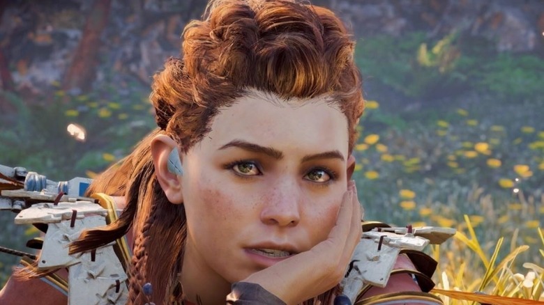 Aloy hand on face