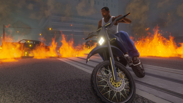 CJ on a motorcycle surrounded by flames in GTA San Andreas Definitive Edition