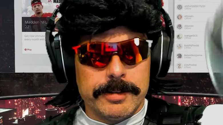 Dr Disrespect in white turtleneck with mouse