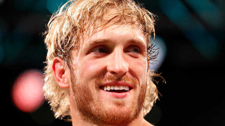 Logan Paul smiles at match