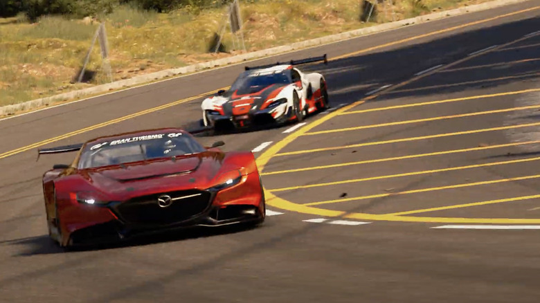 Cars racing around a track