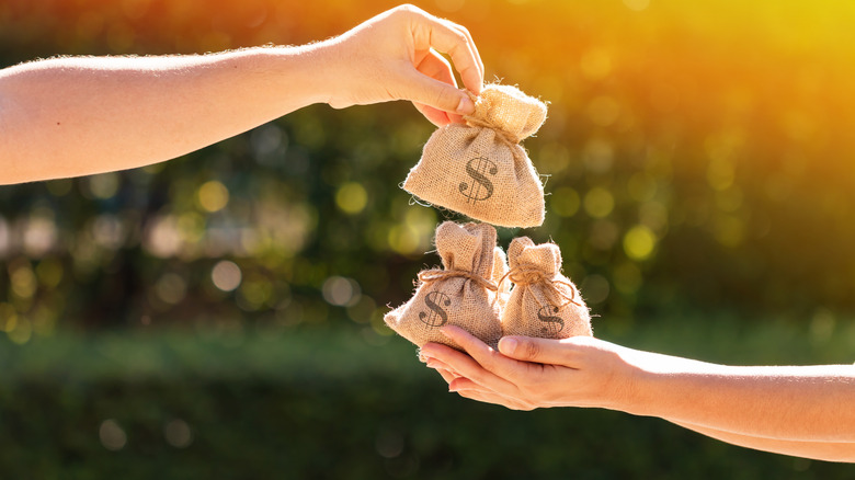 Two people exchanging money