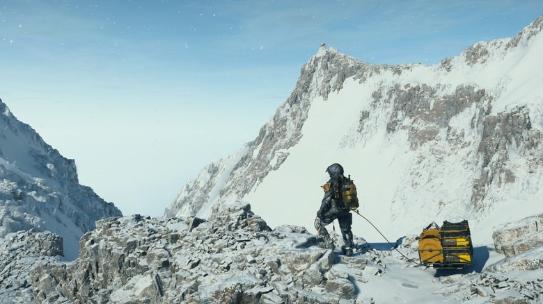 Sam carrying packages over snowy mountains in Death Stranding 2: On the Beach (2025)