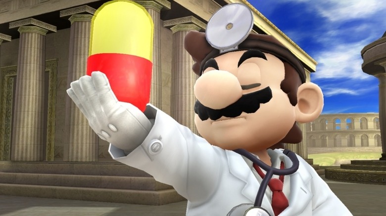 Dr. Mario holding up a red and yellow capsule