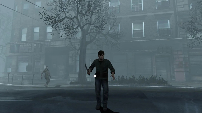 Murphy Pendleton approaches a building while holding a knife in Silent Hill: Downpour