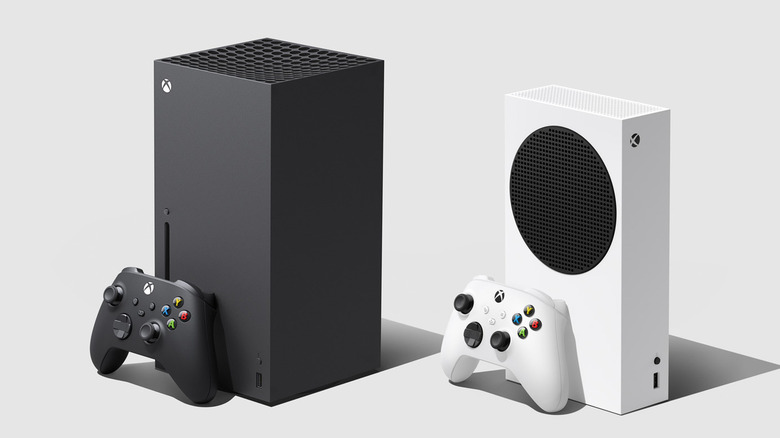A black Xbox Series X sits next to a white Xbox Series S