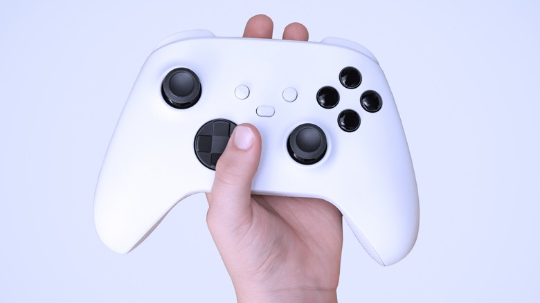 Kid holding Xbox controller