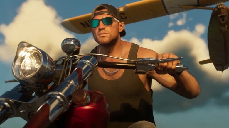 Jason riding a motorcycle with a plane in the background